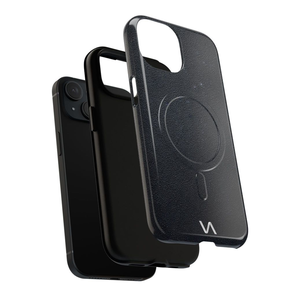 Graphite slim MagSafe iPhone case floating beside black iPhone, minimalist design.